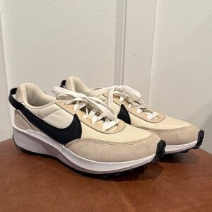 Nike Cream and Black Running Shoes